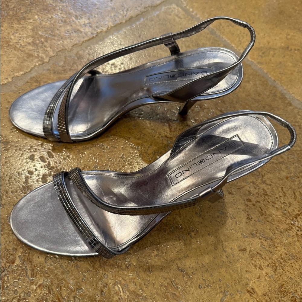 Bandolino metallic silver heeled sandals in a size 7 1/2.